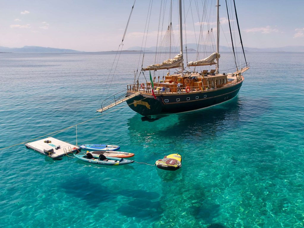 Yacht charters in Greece with crew. Motor sailer charter in Greek islands. Luxury crewed sailing charters Greece.
